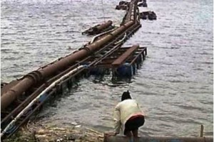 Saluran air PDAM di waduk Darma